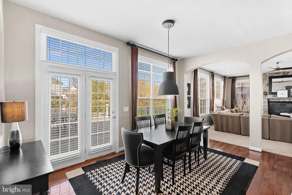 a view of a patio with swimming pool and furniture