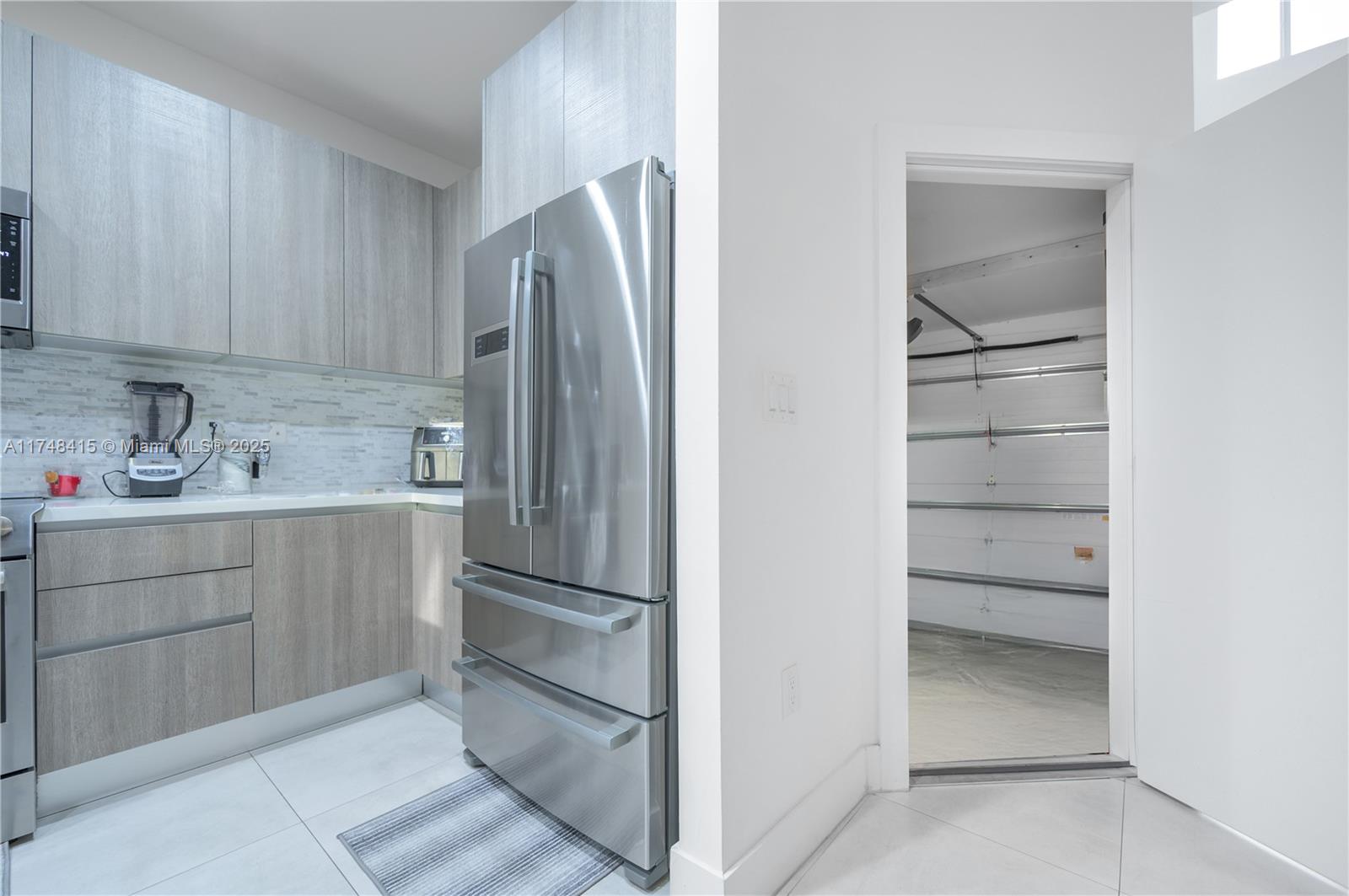 7250 Northwest 103rd Path Doral, FL 33178 - Photo 15 of 28 a kitchen with cabinets and stainless steel appliances