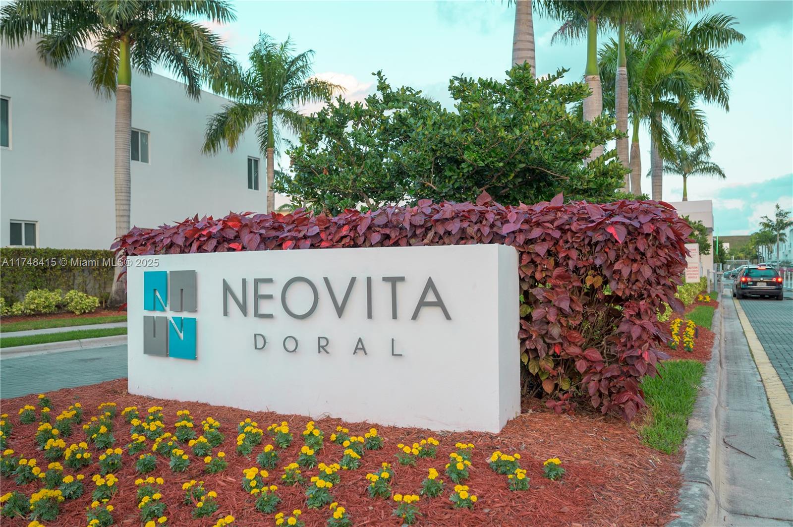 7250 Northwest 103rd Path Doral, FL 33178 - Photo 2 of 28 a sign on the side of the road