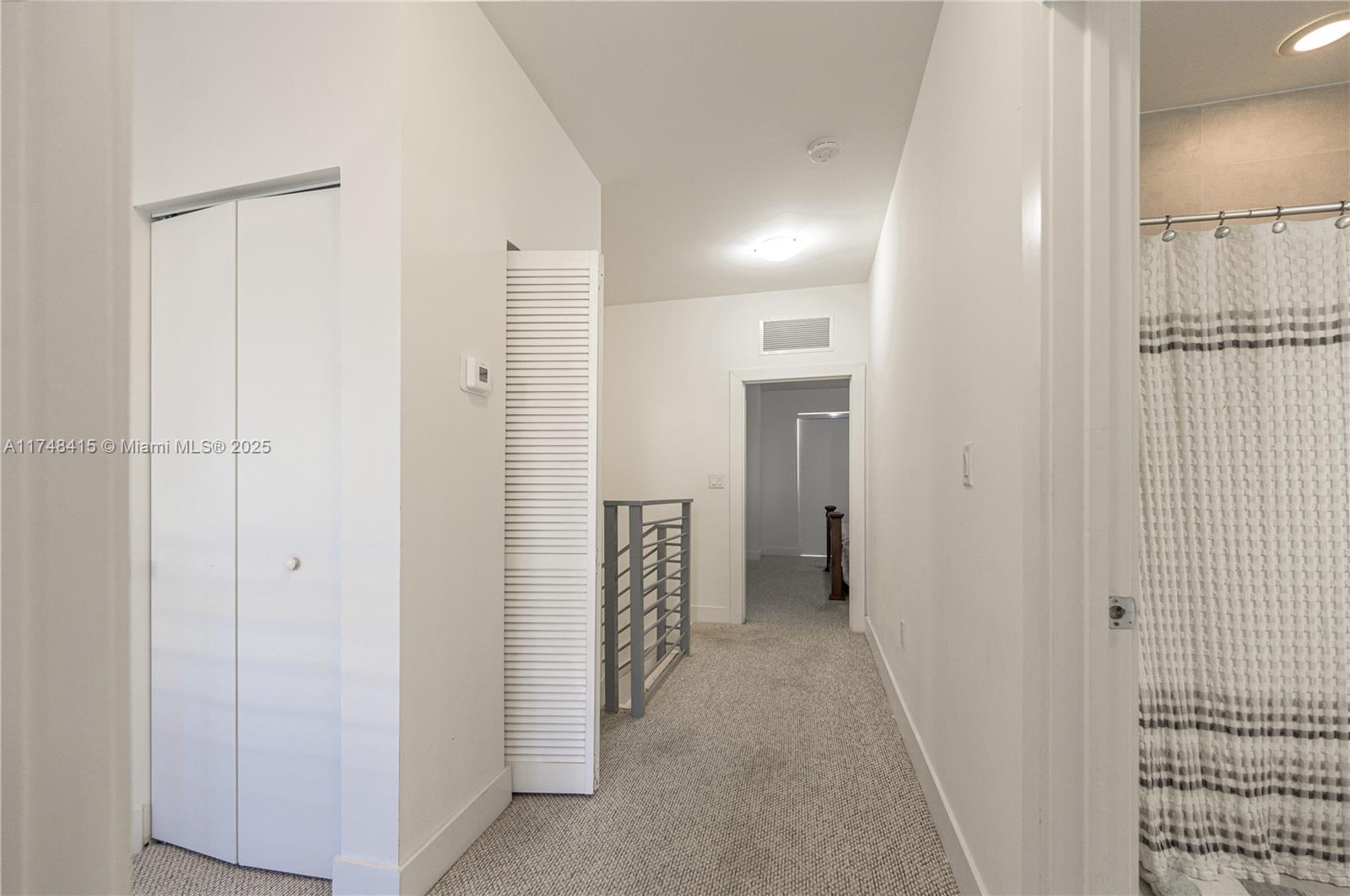 7250 Northwest 103rd Path Doral, FL 33178 - Photo 21 of 28 a view of a hallway with a bathroom