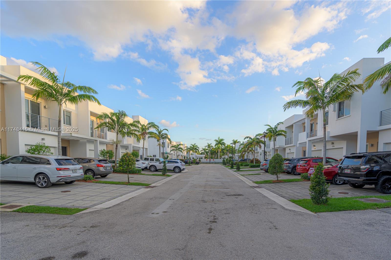 7250 Northwest 103rd Path Doral, FL 33178 - Photo 5 of 28 a city street lined with buildings and cars