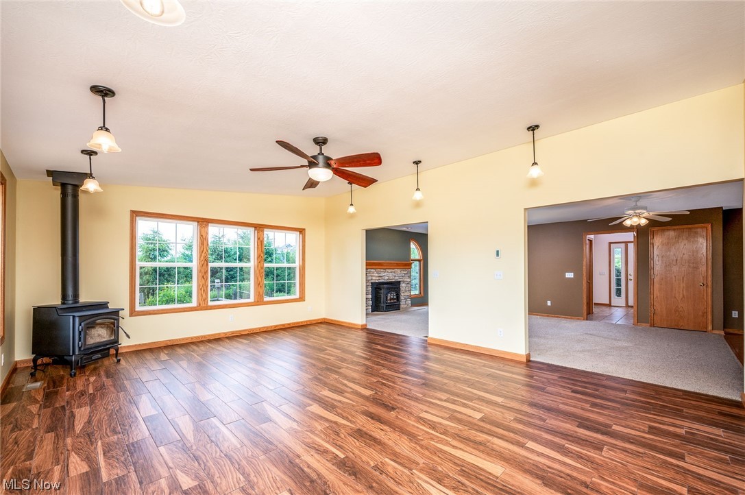2449 Hartville Road Mogadore, OH 44260 - Photo 16 of 35 4 Season Sun Room with wood stove & heated floors
