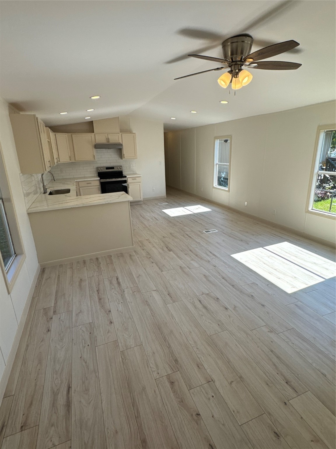 31306 East Timberloch Trail Magnolia, TX 77355 - Photo 2 of 18 a view of empty room with wooden floor and window
