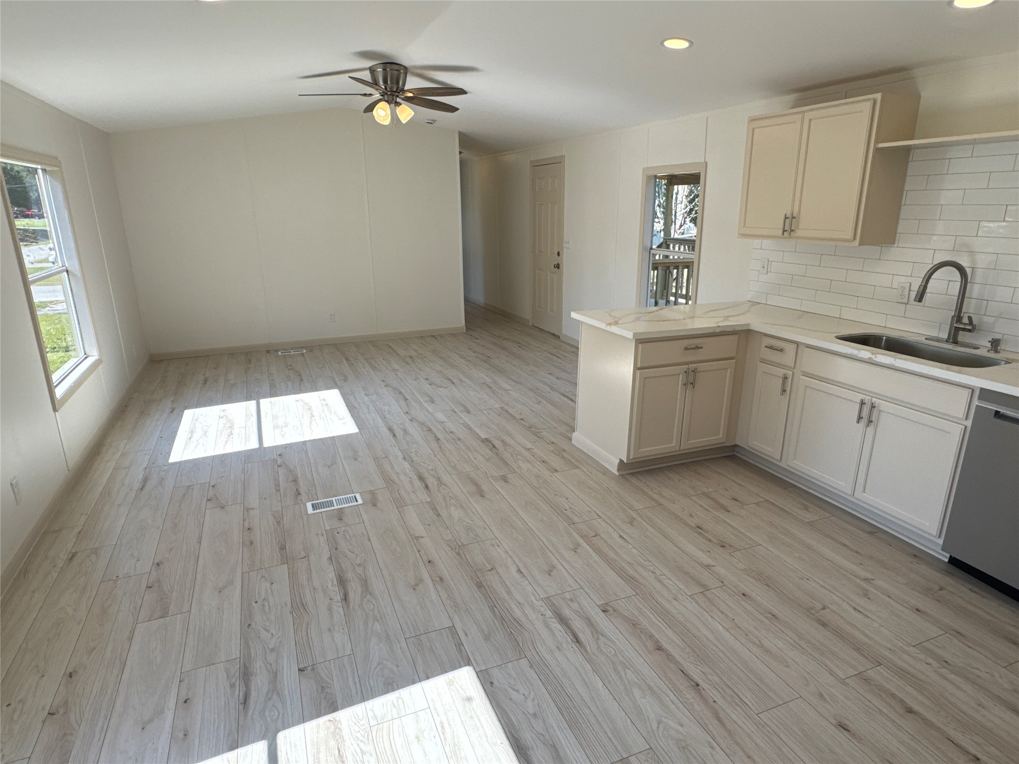 31306 East Timberloch Trail Magnolia, TX 77355 - Photo 4 of 18 wooden floor in an empty room with a window