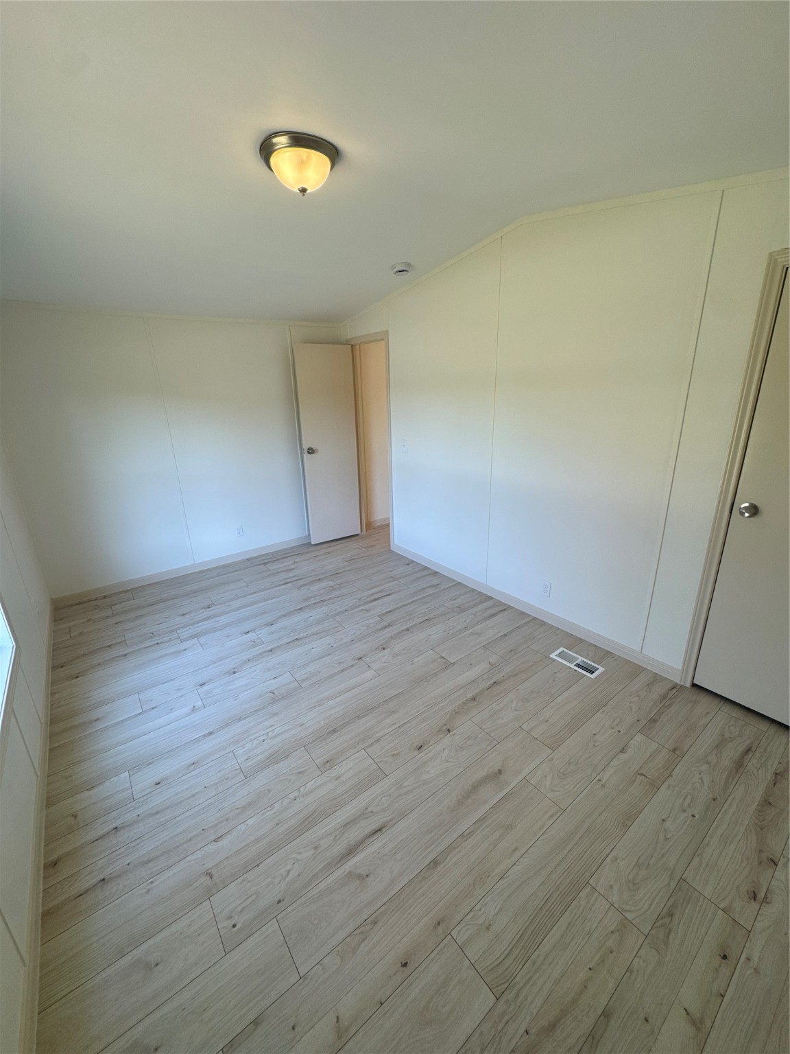 31306 East Timberloch Trail Magnolia, TX 77355 - Photo 7 of 18 a view of an empty room and wooden floor