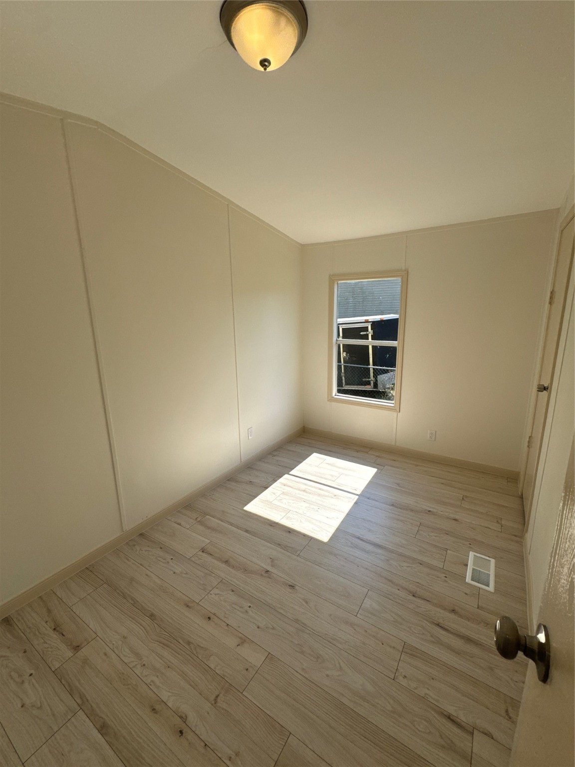 31306 East Timberloch Trail Magnolia, TX 77355 - Photo 10 of 18 a view of empty room with wooden floor and fan