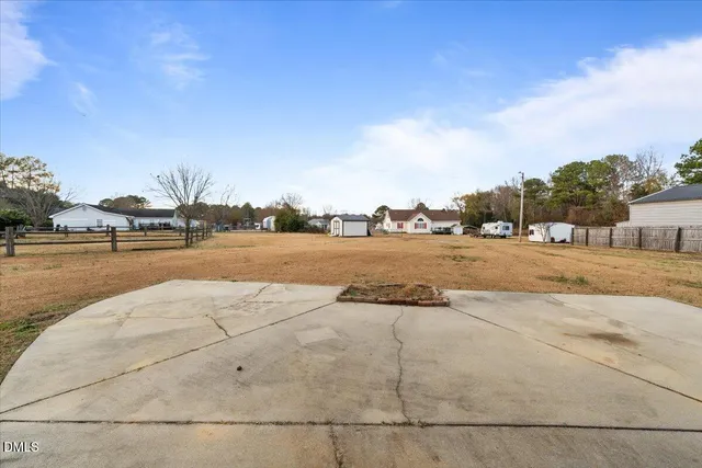 a view of a street with an outdoor space