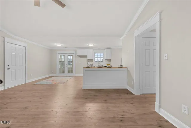 a view of kitchen appliances and cabinets