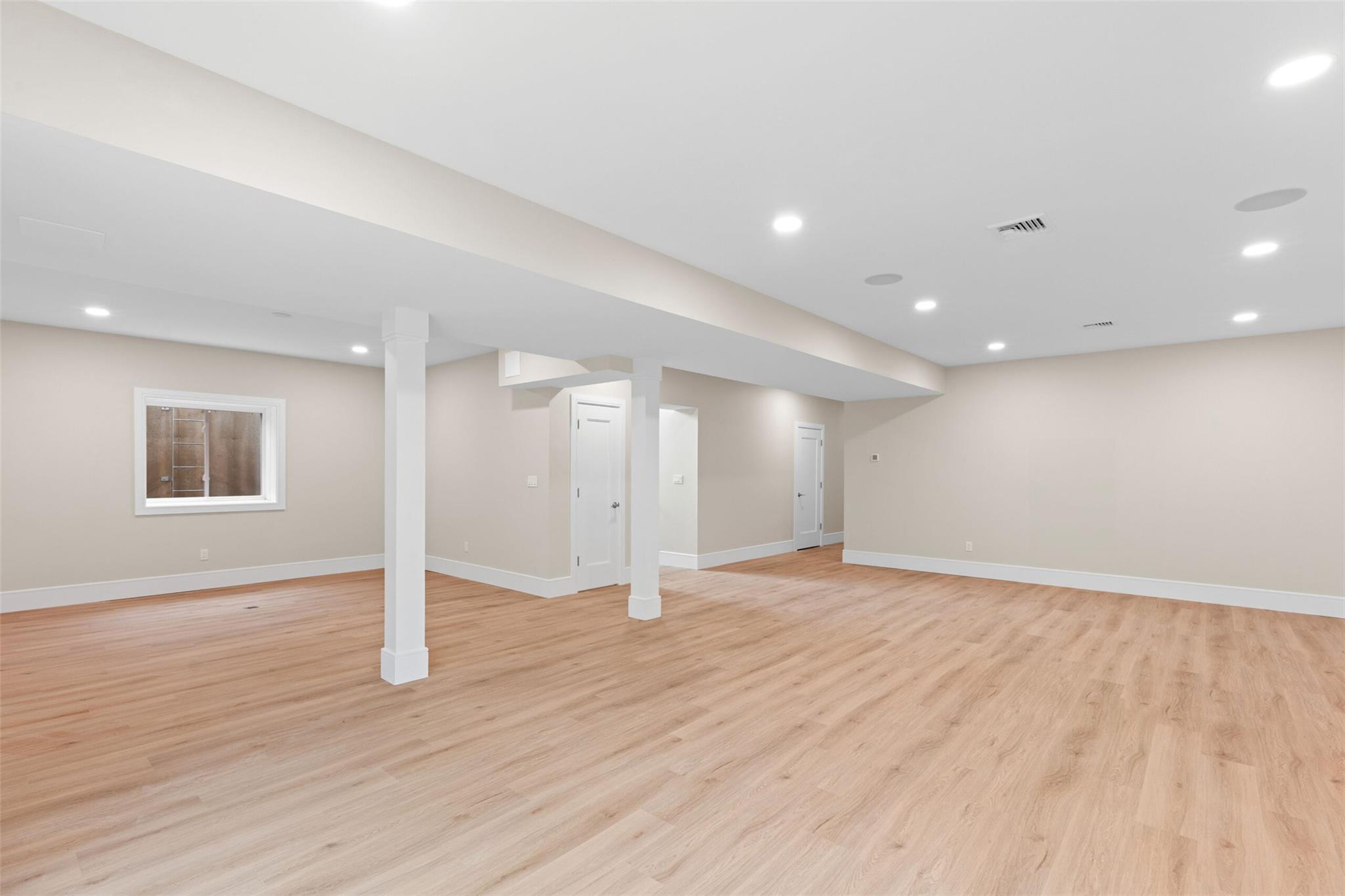 26 Pine Tree Road Southampton, NY 11968 - Photo 21 of 25 Finished below grade area featuring light wood-style flooring, baseboards, and recessed lighting