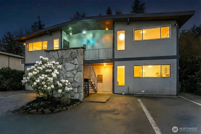 a kitchen with a refrigerator and a sink