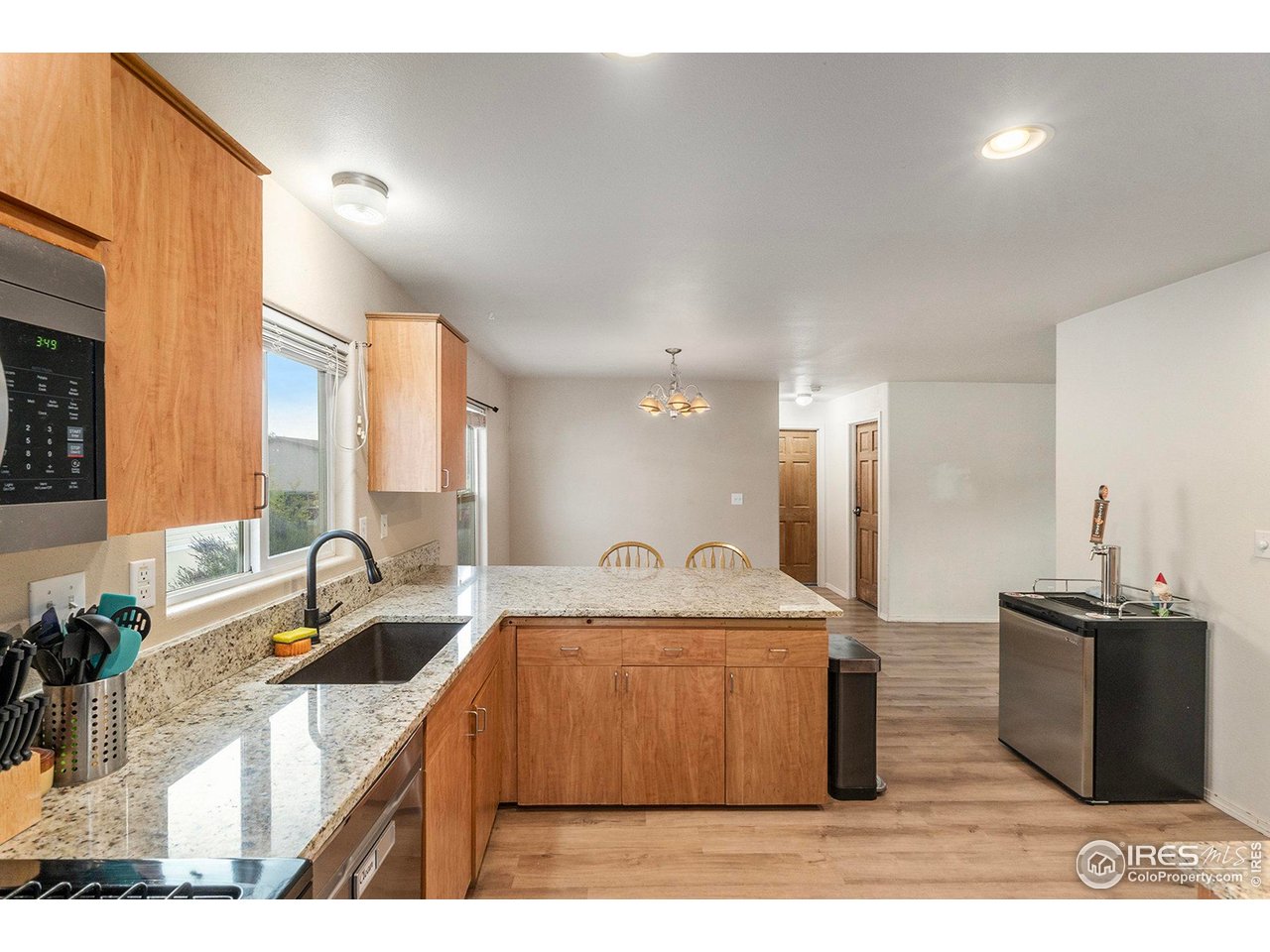 10684 Aspen Street, Unit 72 Firestone, CO 80504 - Photo 14 of 21 a bathroom with a sink and a mirror