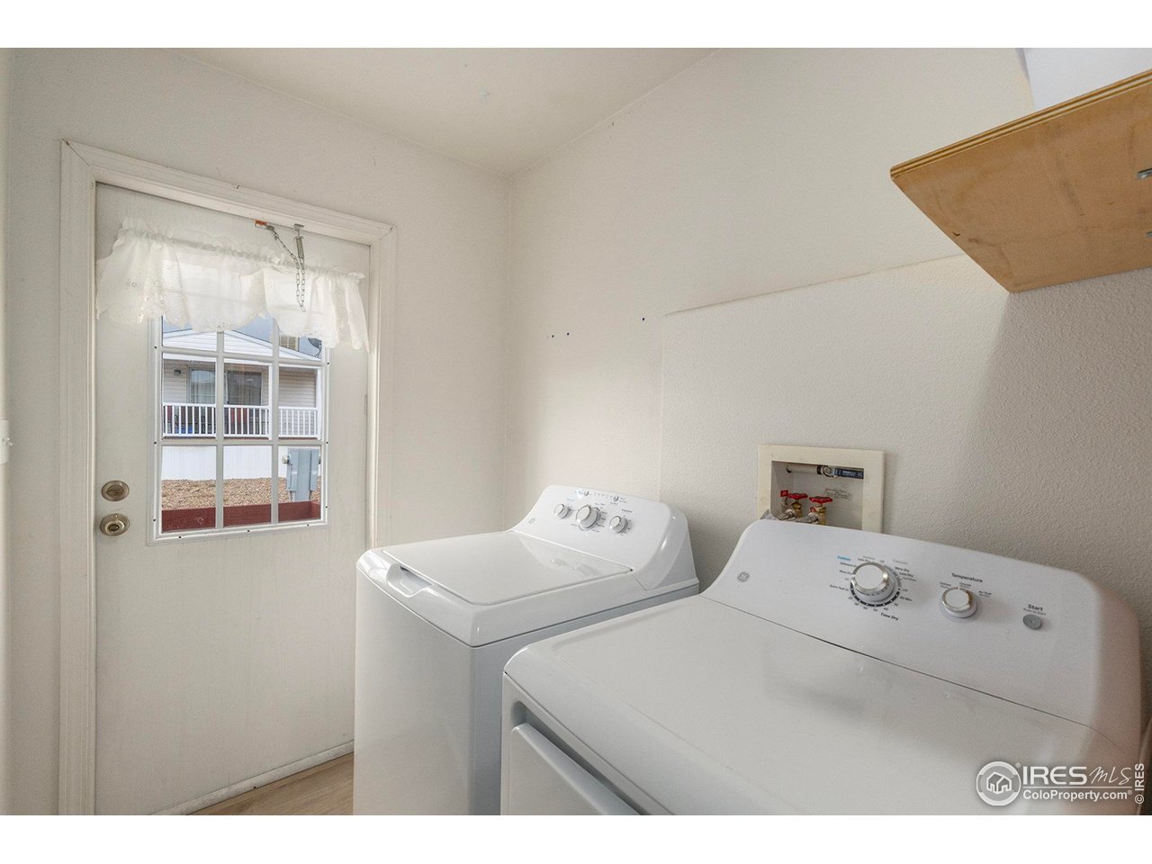 10684 Aspen Street, Unit 72 Firestone, CO 80504 - Photo 19 of 21 a utility room with dryer and washer