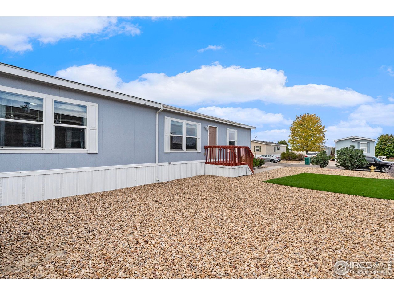 10684 Aspen Street, Unit 72 Firestone, CO 80504 - Photo 6 of 21 a house view with a garden space