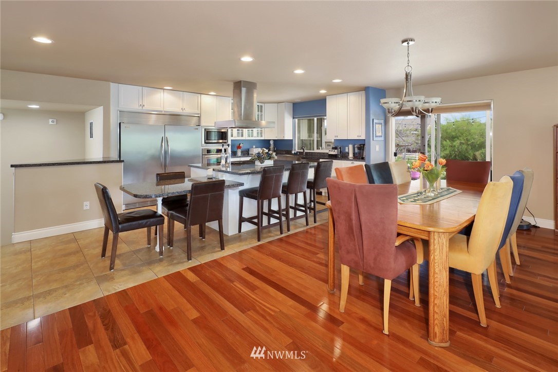 1468 East Smith Road Bellingham, WA 98226 - Photo 5 of 40 a dining room with stainless steel appliances granite countertop a dining table chairs and granite counter tops