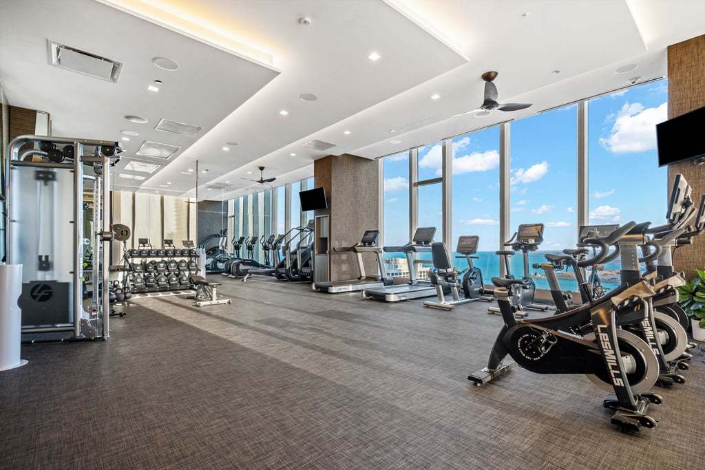 363 East Wacker Drive, Unit 3009 Chicago, IL 60601 - Photo 22 of 38 a view of a room with gym equipment