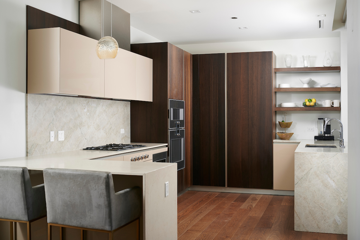 363 East Wacker Drive, Unit 3009 Chicago, IL 60601 - Photo 7 of 38 a kitchen with stainless steel appliances a stove a refrigerator and a cabinets