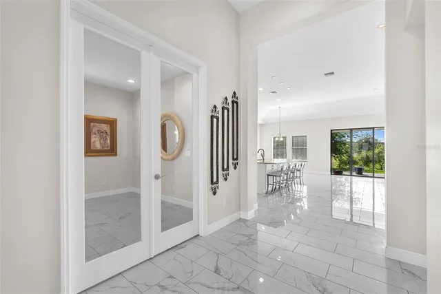 a view of a livingroom with an entryway