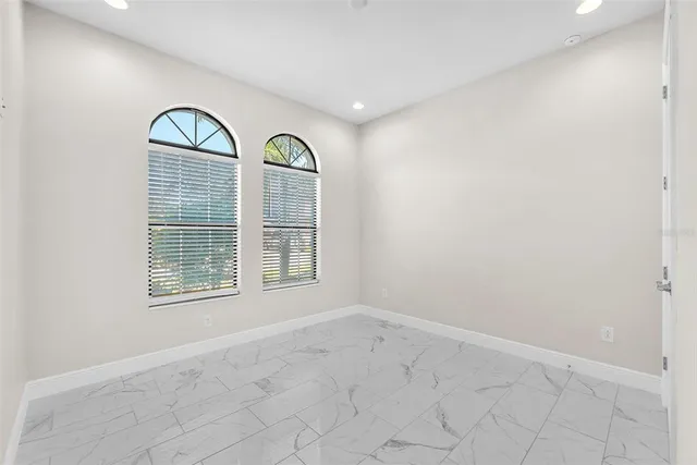 an empty room with window