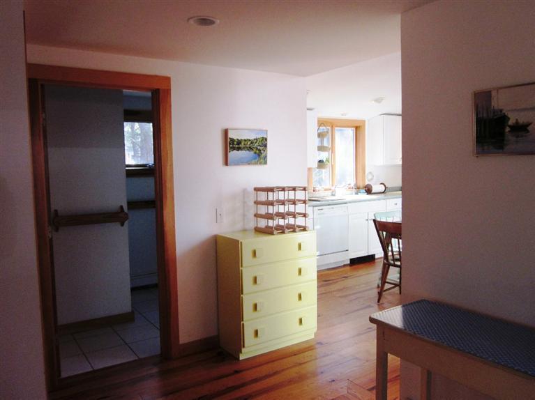 21 Tecumseh Road Wellfleet, MA 02667 - Photo 13 of 33 a view of a workspace with furniture and wooden floor