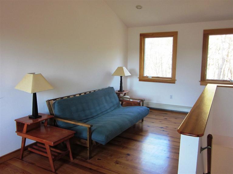21 Tecumseh Road Wellfleet, MA 02667 - Photo 17 of 33 a living room with furniture and a window