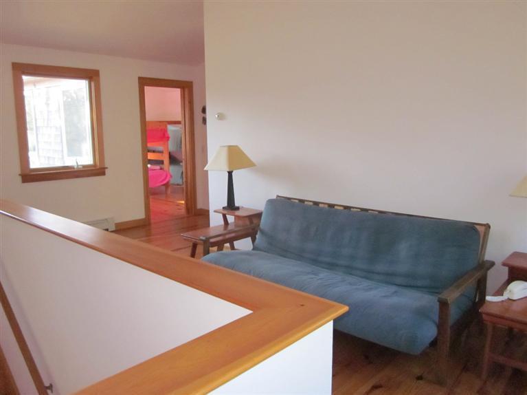 21 Tecumseh Road Wellfleet, MA 02667 - Photo 18 of 33 a living room with furniture and a window