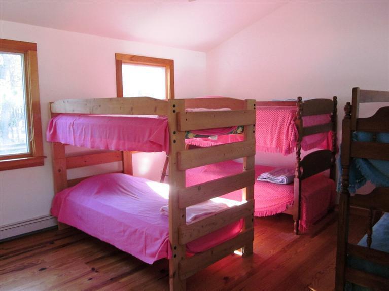 21 Tecumseh Road Wellfleet, MA 02667 - Photo 19 of 33 a bedroom with a bed and a dresser