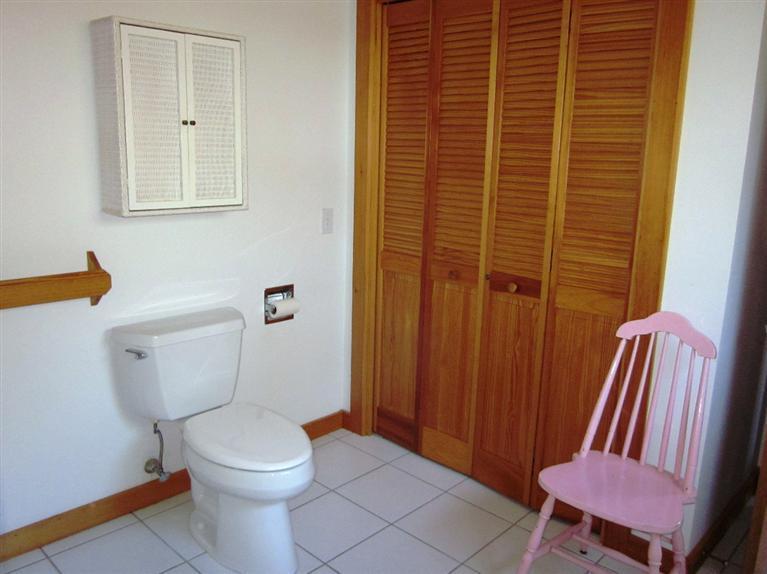 21 Tecumseh Road Wellfleet, MA 02667 - Photo 22 of 33 a bathroom with a toilet and a sink