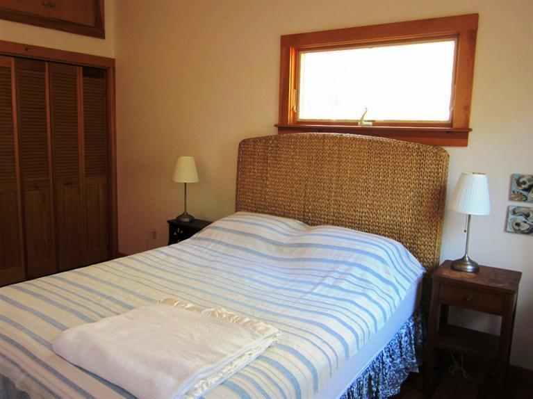21 Tecumseh Road Wellfleet, MA 02667 - Photo 23 of 33 a bedroom with a bed and a window