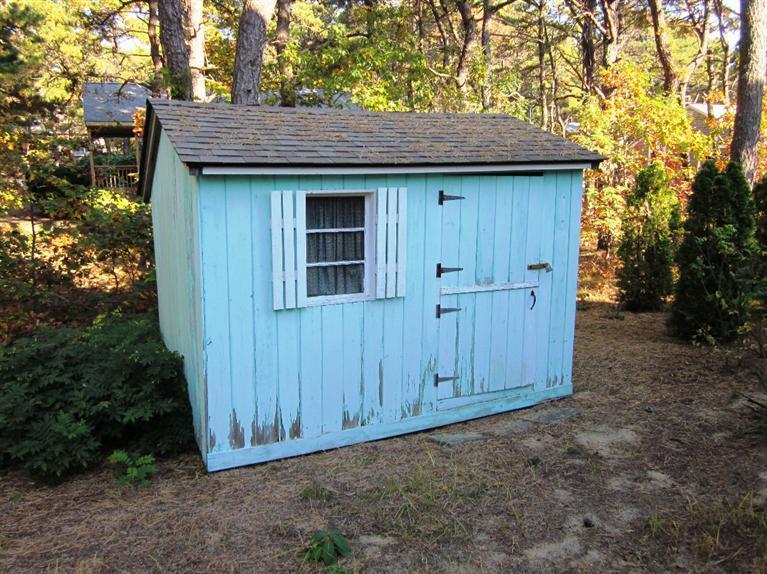 21 Tecumseh Road Wellfleet, MA 02667 - Photo 32 of 33 a wooden door in front of a house