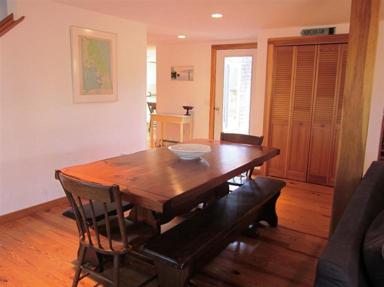 21 Tecumseh Road Wellfleet, MA 02667 - Photo 8 of 33 a view of a dining room with furniture and wooden floor