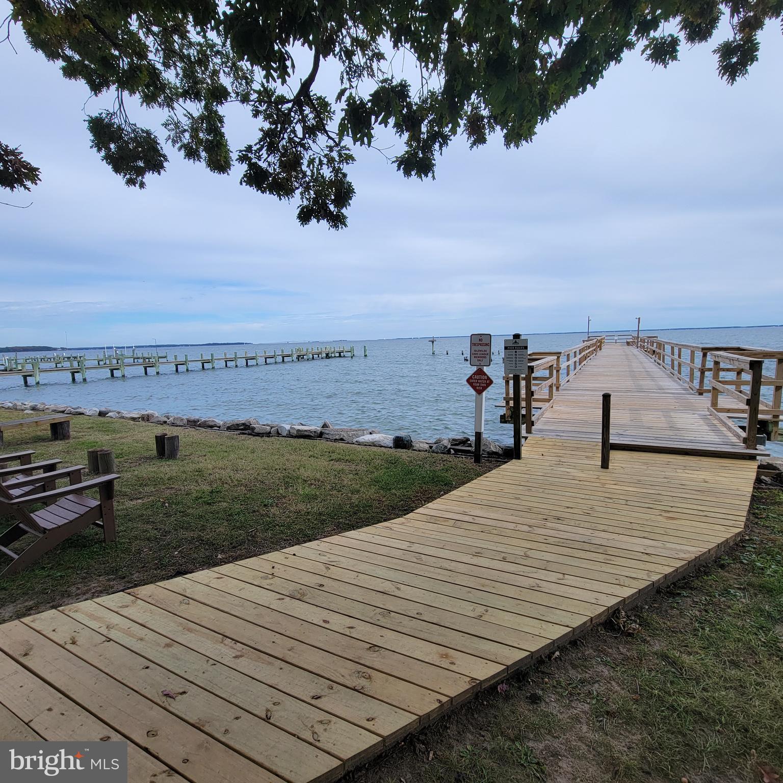 4715 Frederick Avenue Shady Side, MD 20764 - Photo 16 of 20 a view of a terrace with a lake
