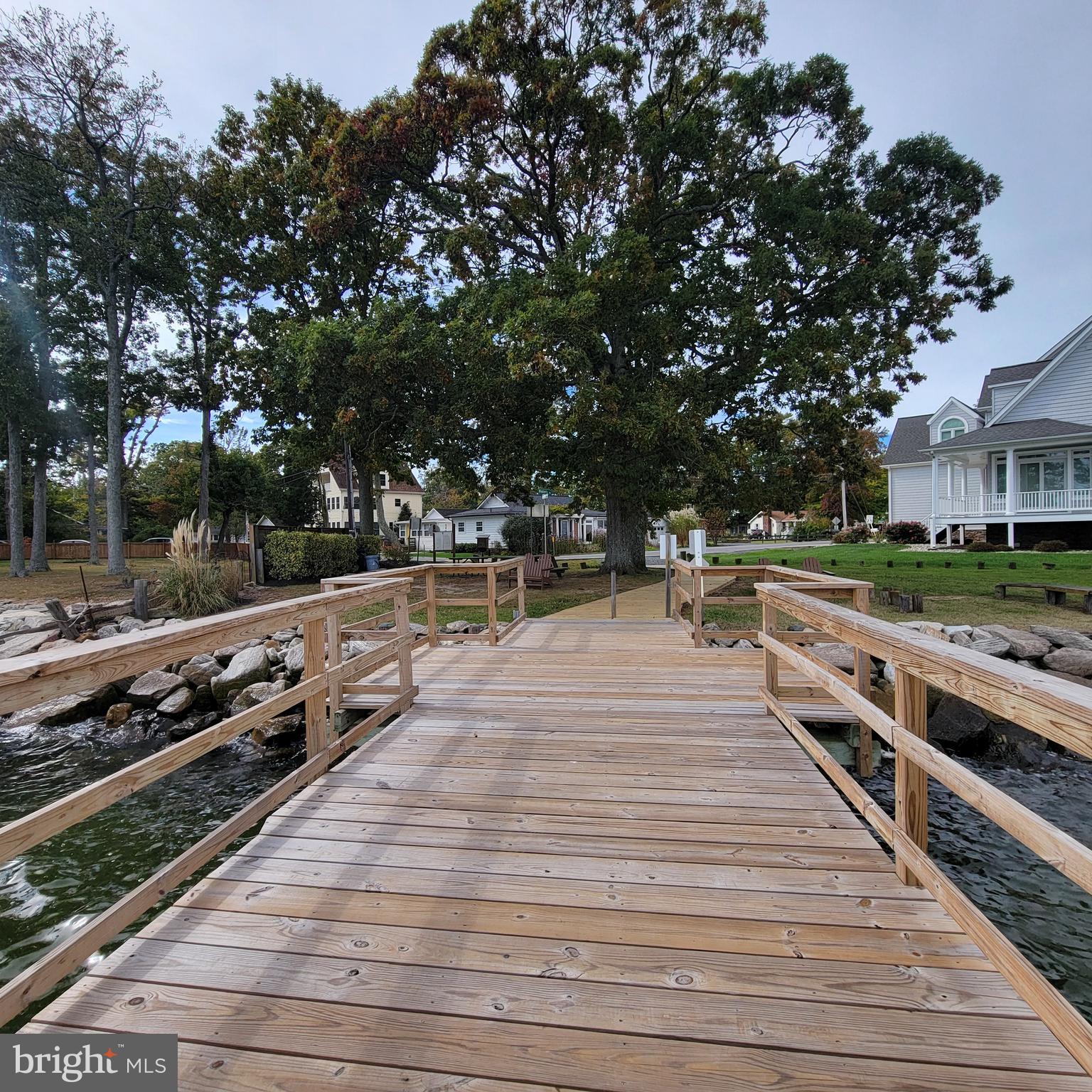 4715 Frederick Avenue Shady Side, MD 20764 - Photo 18 of 20 an outdoor space with wooden benches
