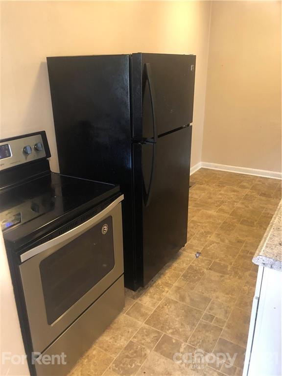 1020 Rodey Avenue, Unit A Charlotte, NC 28206 - Photo 3 of 8 a close view of a refrigerator in the kitchen