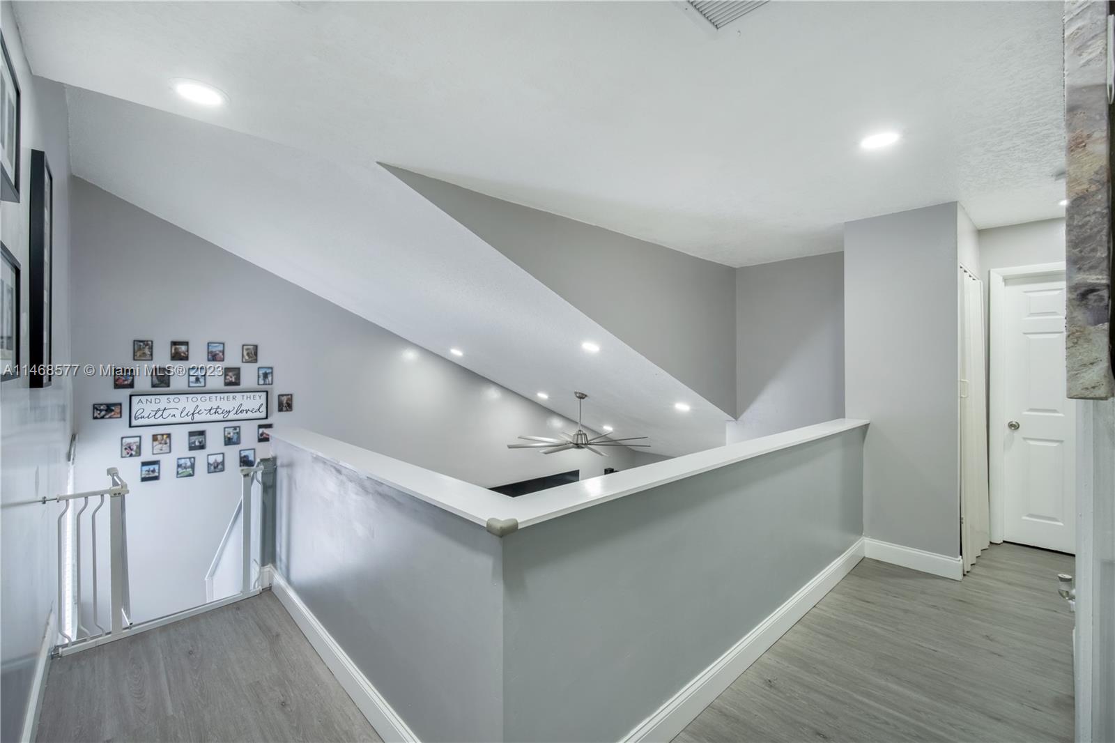5232 Gate Lake Road, Unit 5232 Tamarac, FL 33319 - Photo 16 of 37 a kitchen with stainless steel appliances a refrigerator and a stove top oven
