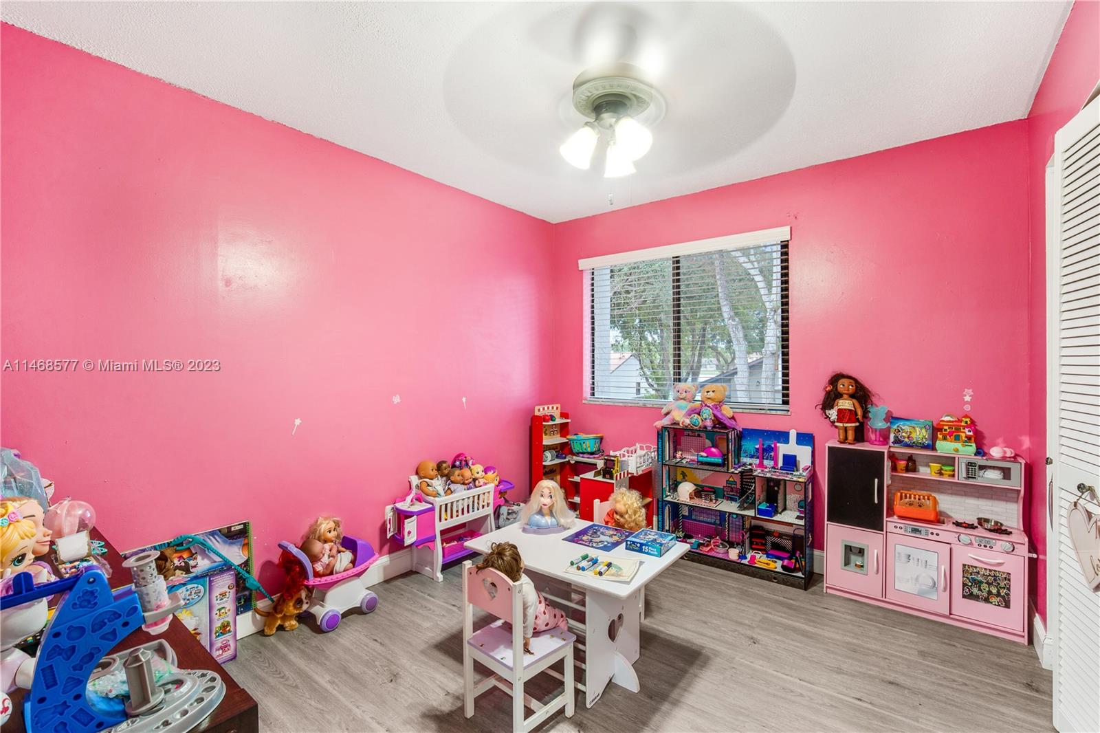 5232 Gate Lake Road, Unit 5232 Tamarac, FL 33319 - Photo 23 of 37 a play room with furniture and a window