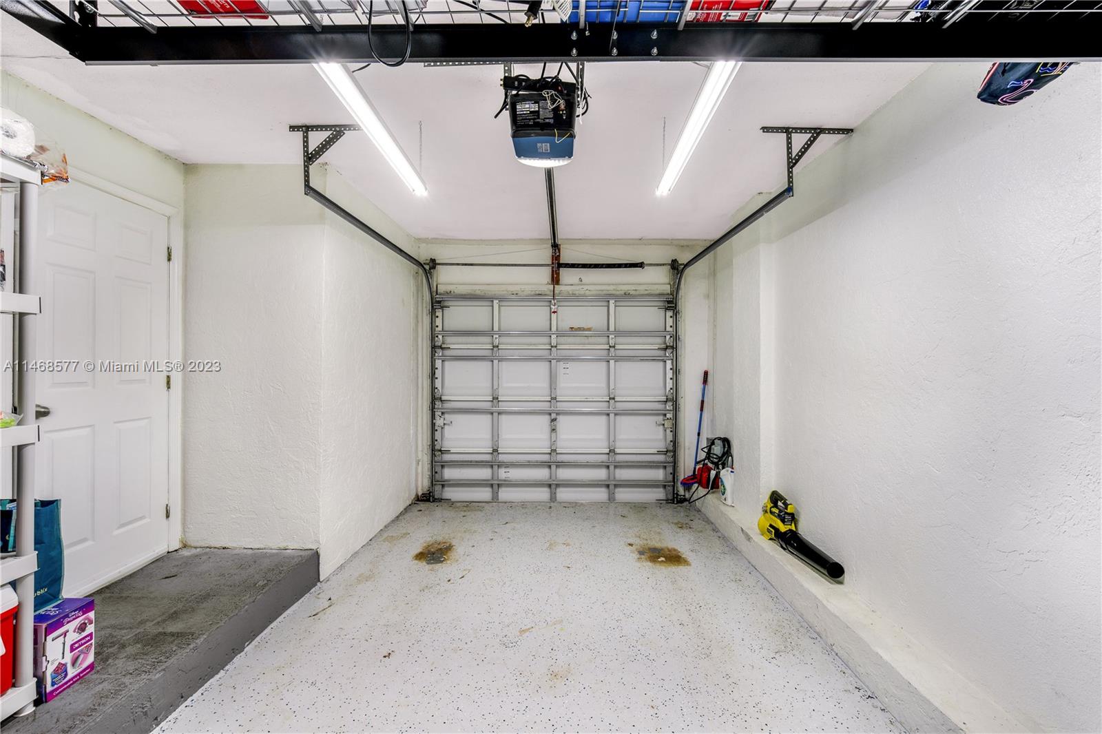 5232 Gate Lake Road, Unit 5232 Tamarac, FL 33319 - Photo 27 of 37 a view of a garage