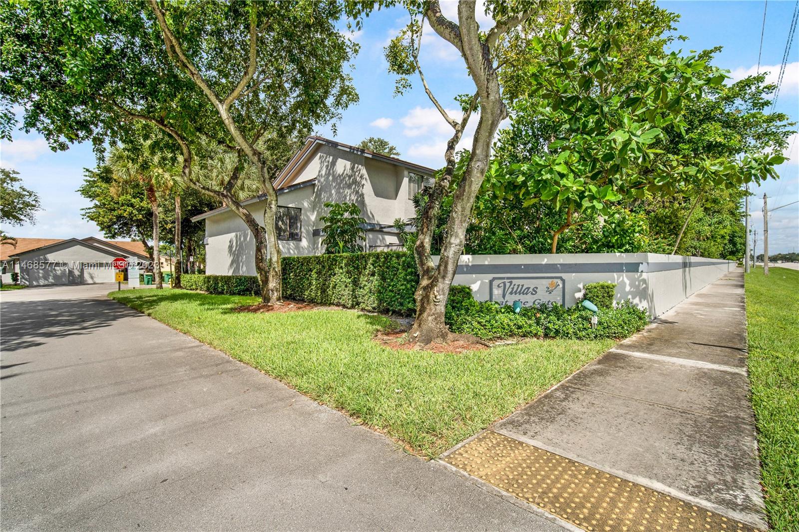 5232 Gate Lake Road, Unit 5232 Tamarac, FL 33319 - Photo 33 of 37 a view of park with tree s