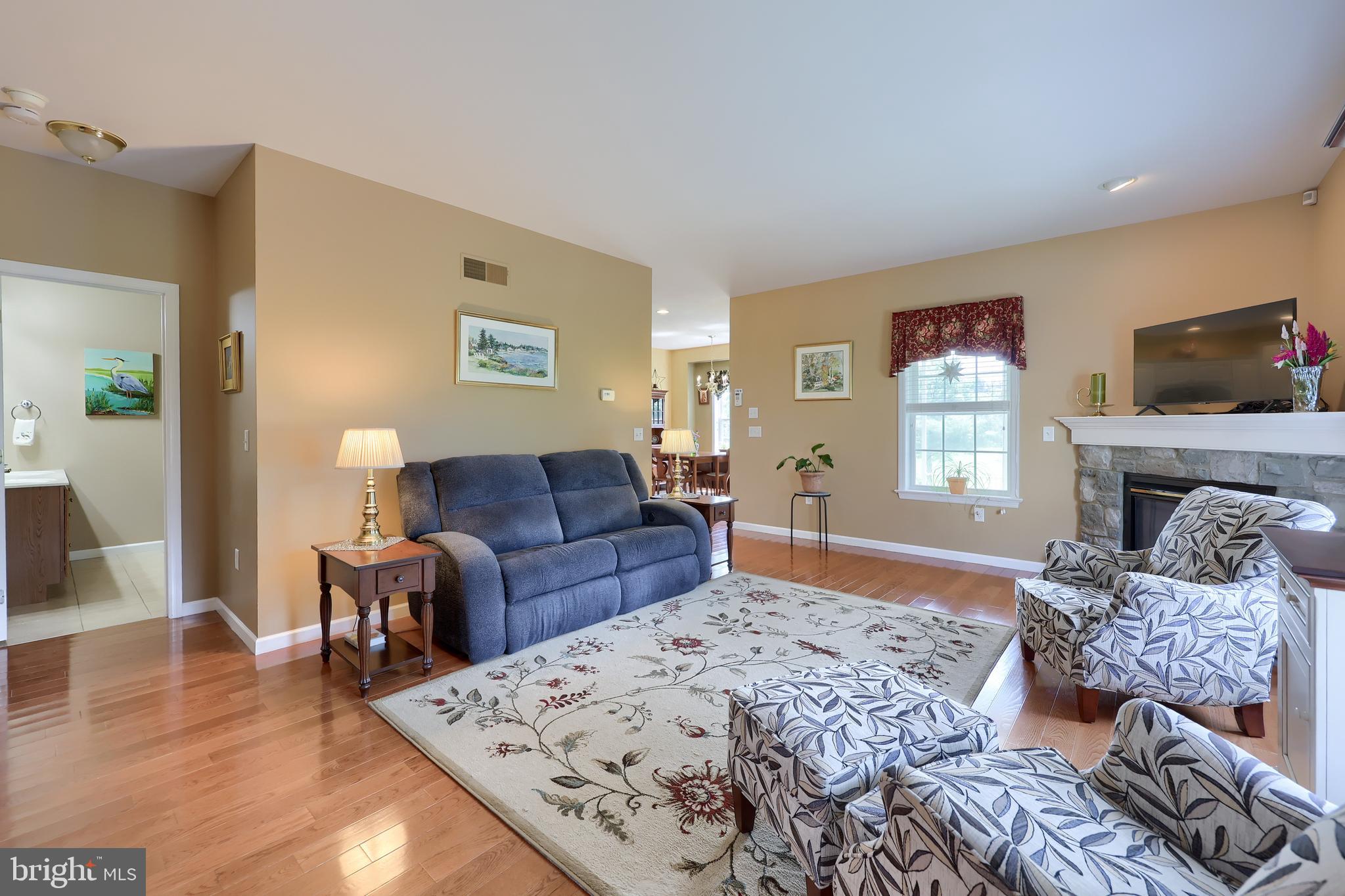 520 Providence Court Lititz, PA 17543 - Photo 5 of 44 a living room with furniture and a flat screen tv