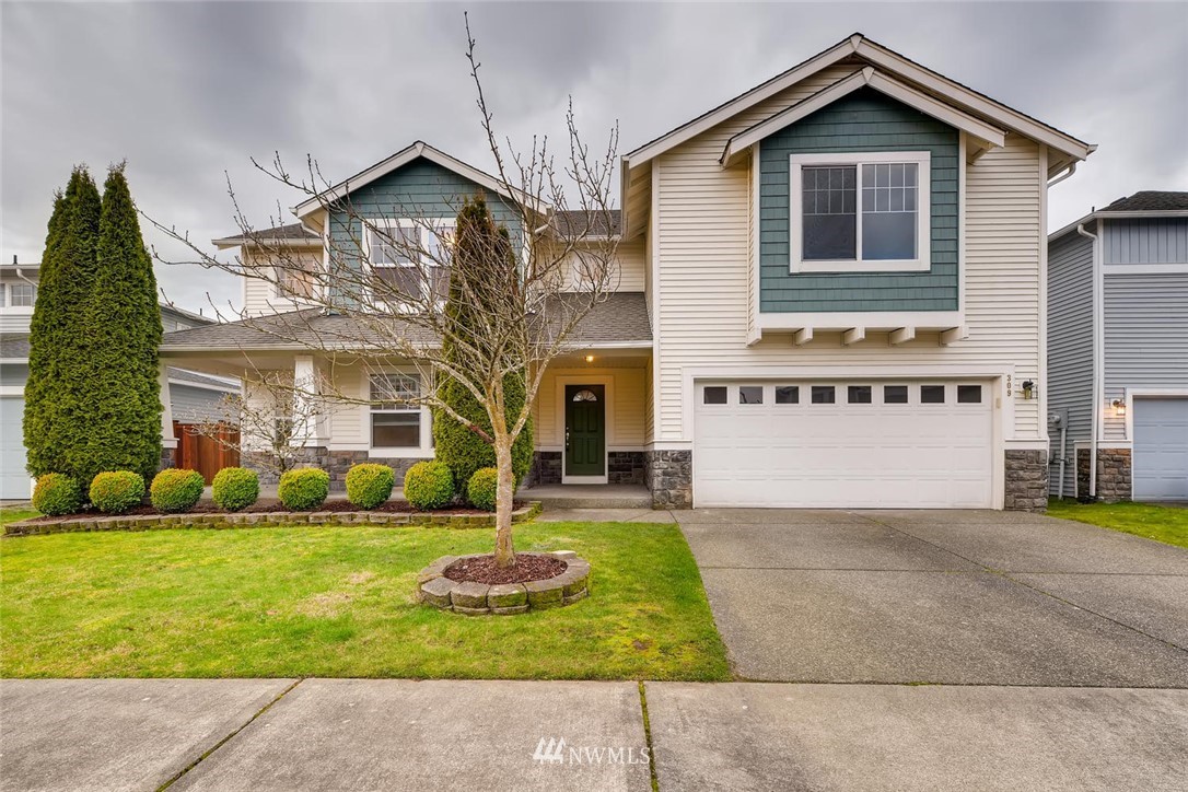 309 Index Place Southeast Renton, WA 98056 - Photo 1 of 28 a view of a house with a yard and plants