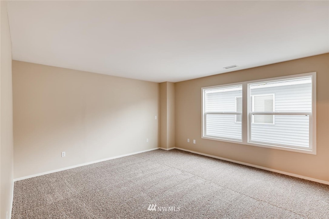 309 Index Place Southeast Renton, WA 98056 - Photo 12 of 28 an empty room with a window