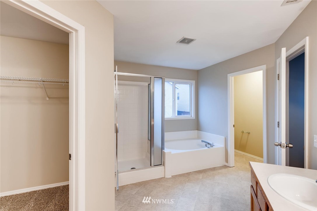 309 Index Place Southeast Renton, WA 98056 - Photo 13 of 28 a view of a bathroom with tub and shower