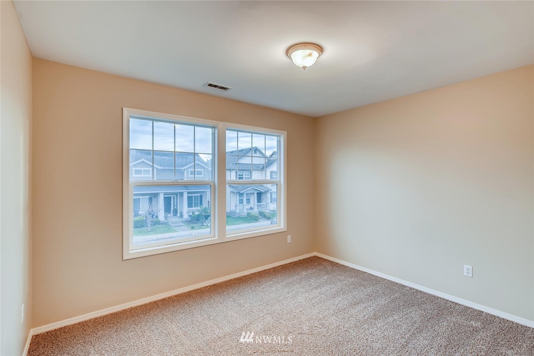 309 Index Place Southeast Renton, WA 98056 - Photo 15 of 28 an empty room with a window