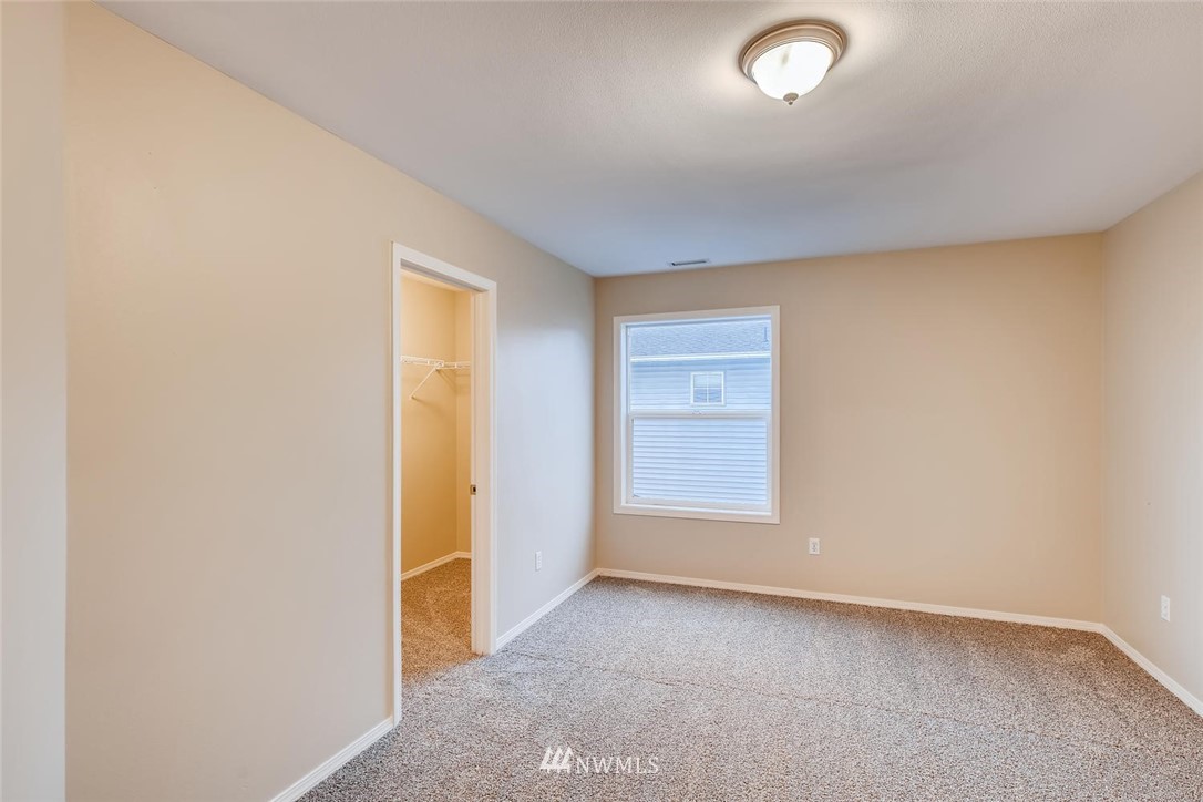309 Index Place Southeast Renton, WA 98056 - Photo 16 of 28 an empty room with windows