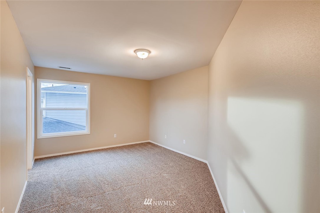 309 Index Place Southeast Renton, WA 98056 - Photo 17 of 28 an empty room with a empty space and window