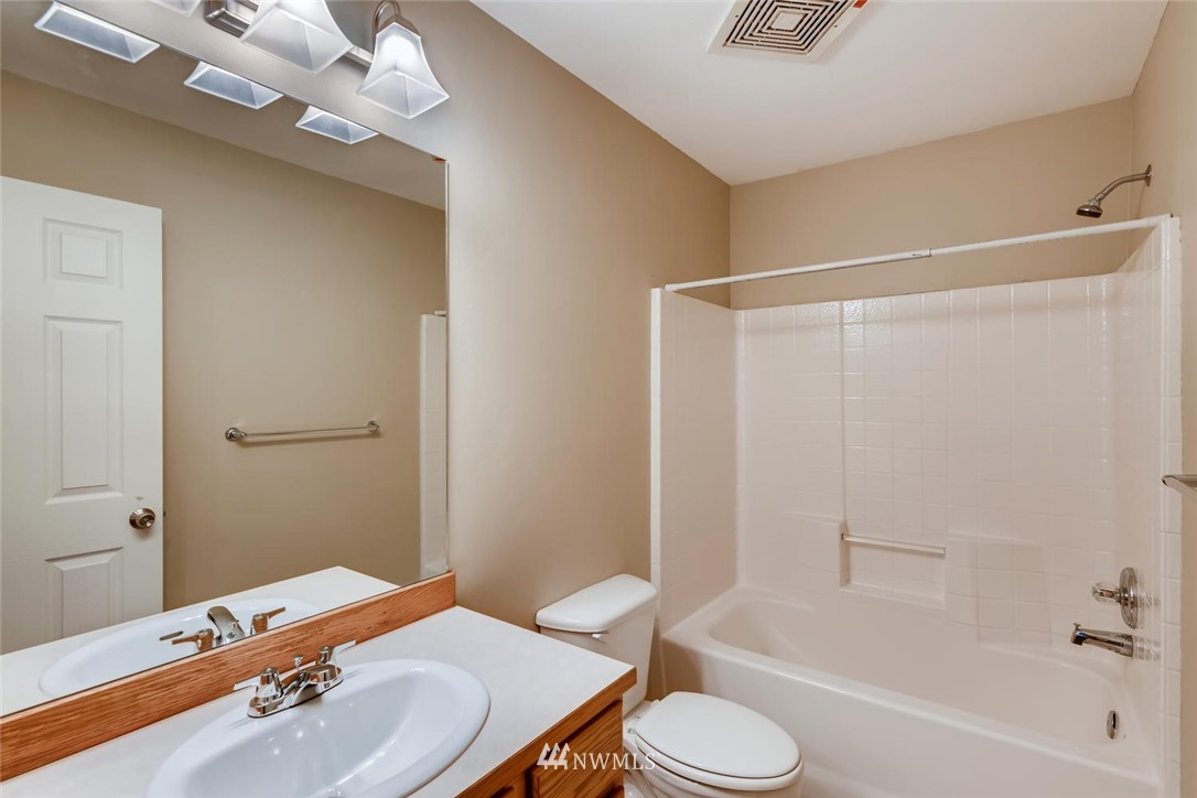 309 Index Place Southeast Renton, WA 98056 - Photo 19 of 28 a bathroom with a sink toilet and shower