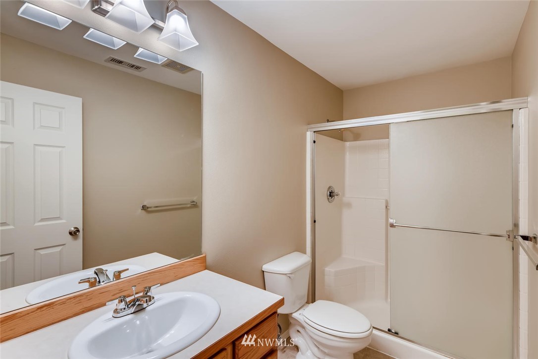 309 Index Place Southeast Renton, WA 98056 - Photo 23 of 28 a bathroom with a sink toilet and shower