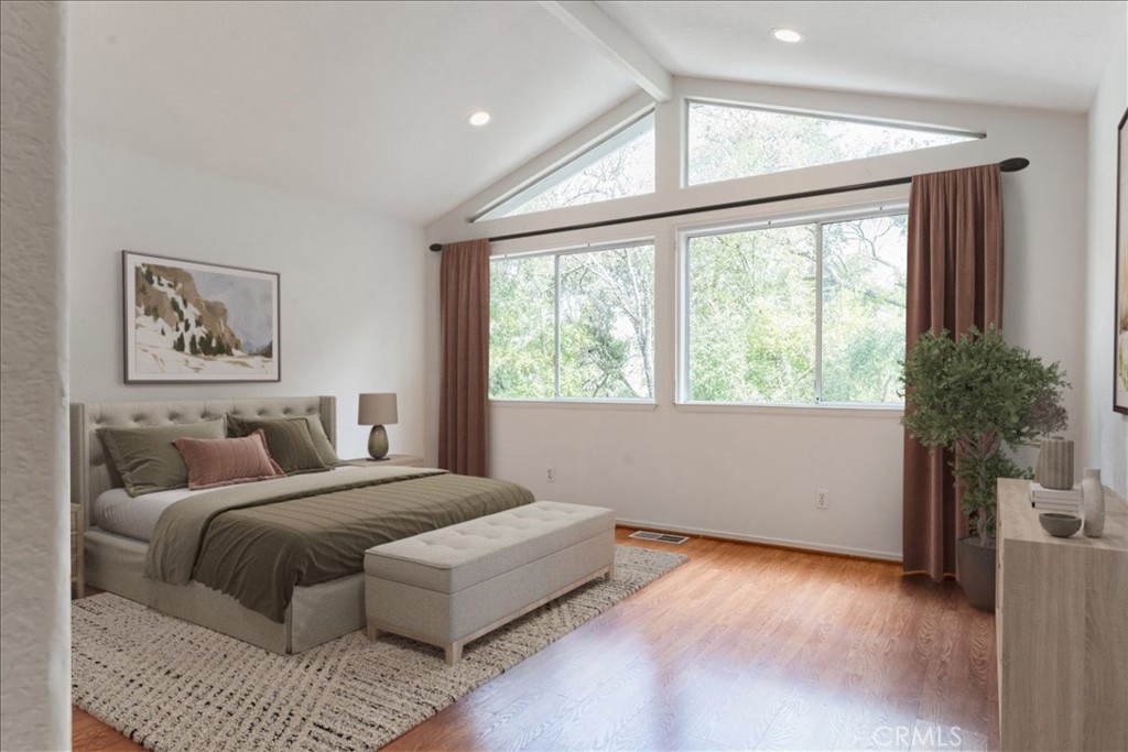 6281 York Mountain Road Templeton, CA 93465 - Photo 13 of 31 a bedroom with a large bed and a window