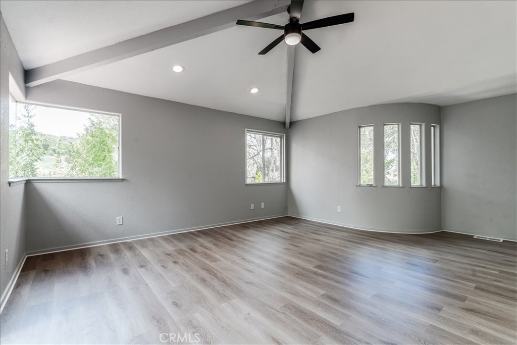 6281 York Mountain Road Templeton, CA 93465 - Photo 15 of 31 a view of an empty room with window and wooden floor