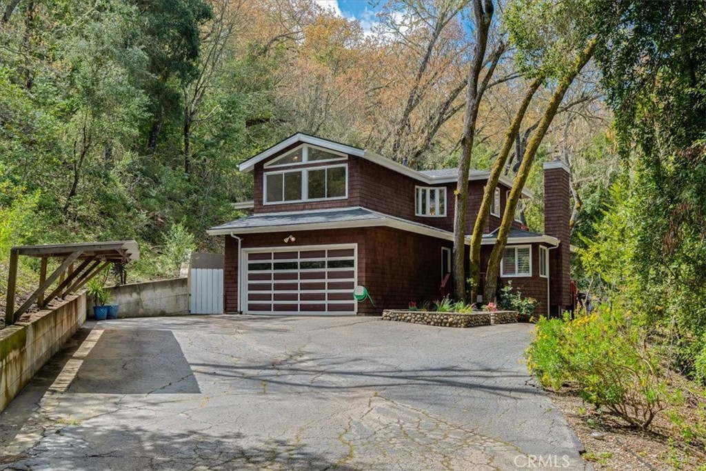 6281 York Mountain Road Templeton, CA 93465 - Photo 2 of 31 a front view of a house with a yard