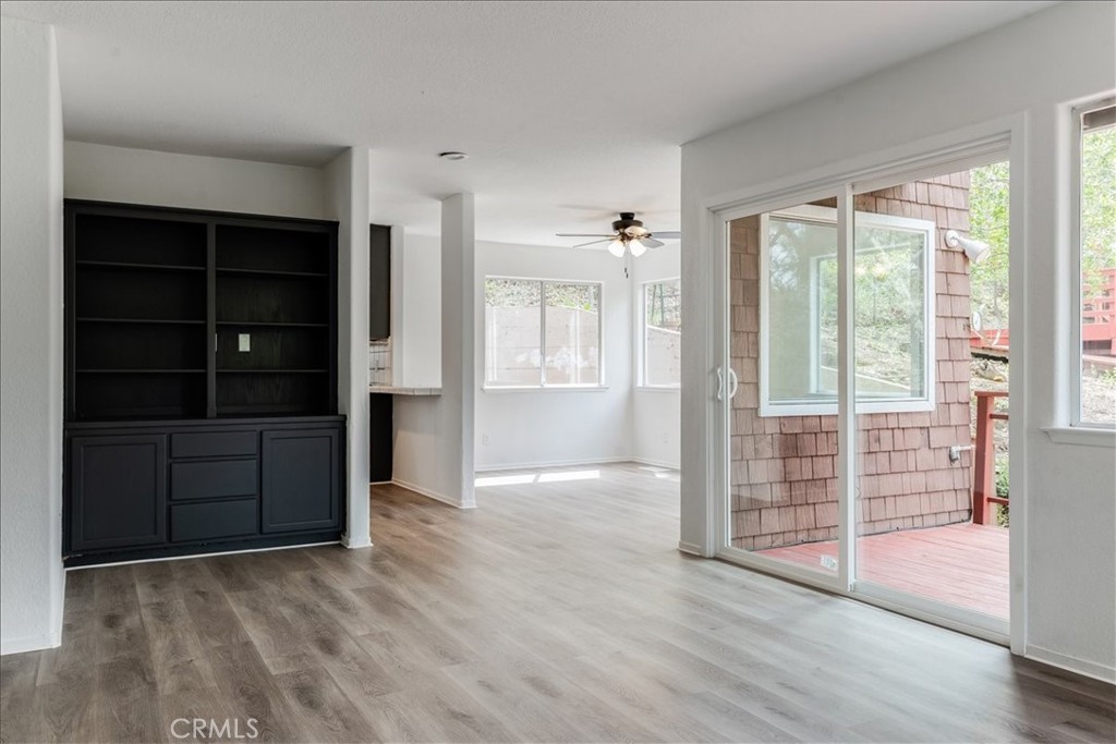 6281 York Mountain Road Templeton, CA 93465 - Photo 6 of 31 wooden floor and window in an empty room